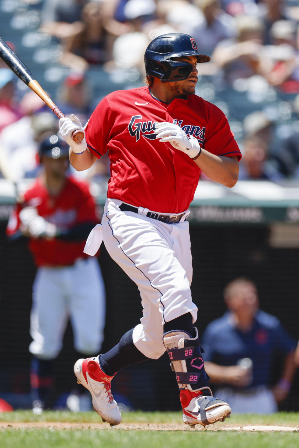 Cleveland Guardians' Josh Naylor hits an RBI single against the Oakland Athletics during the sixth inning of a baseball game, Sunday, June 12, 2022, in Cleveland. (AP Photo/Ron Schwane)