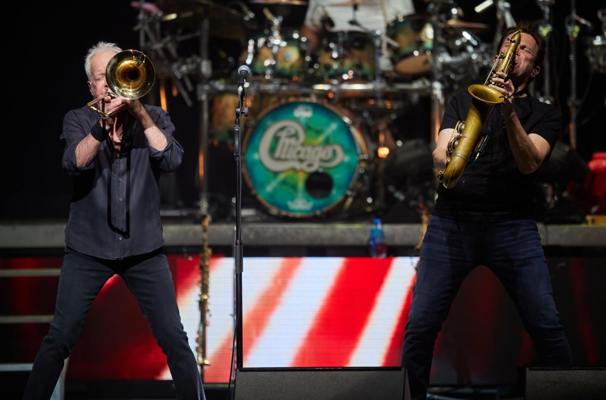 James Pankow (left) and Ray Herrmann preform with Chicago at Ak-Chin Pavilion in Phoenix on June 7, 2022.