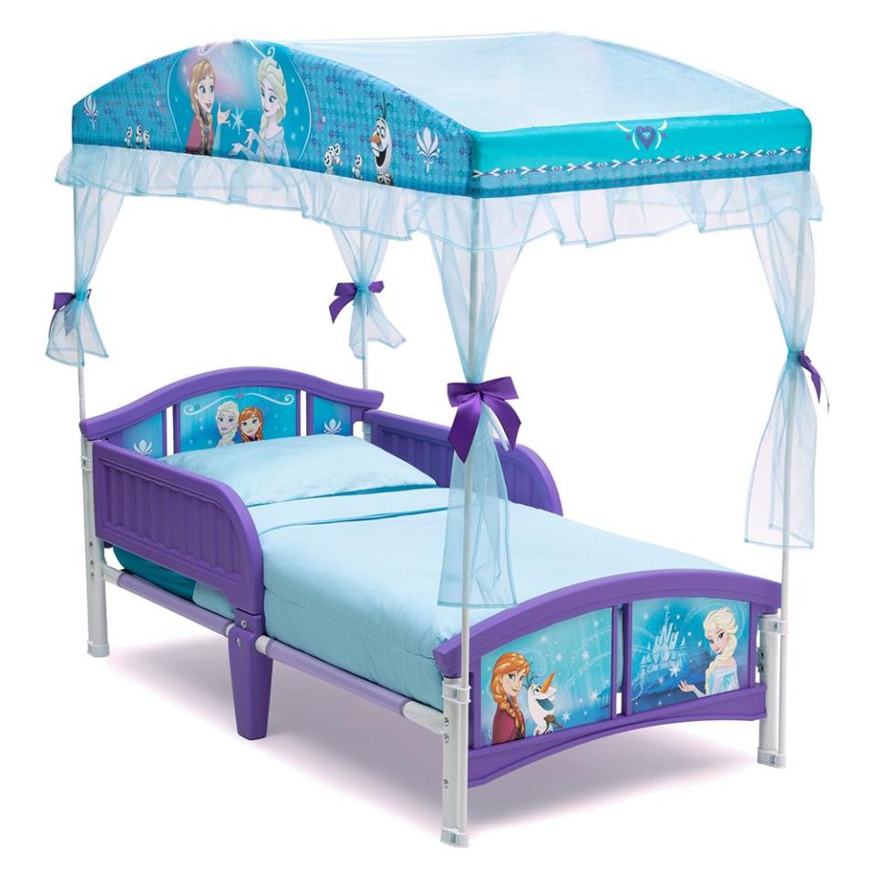 <p><a href="https://go.redirectingat.com?id=74968X1596630&url=https%3A%2F%2Fwww.walmart.com%2Fip%2FDelta-Children-Disney-Frozen-Plastic-Toddler-Canopy-Bed-Purple%2F49079079%3Fwmlspartner%3Dwlpa%26selectedSellerId%3D0%26adid%3D22222222227037391167%26wl1%3Dg%26wl2%3Dc%26wl3%3D90378229832%26wl4%3Dpla-182529573632%26wl5%3D9004359%26wl9%3Dpla%26wl10%3D118664516%26wl11%3Donline%26wl12%3D49079079%26veh%3Dsem%26gclid%3DCj0KCQjw4cOEBhDMARIsAA3XDRgv2E8SkCqHitw5n9qn6qAygLlxKzaFDFA7IUVgLSi2pyc-M6JhjUkaAs2SEALw_wcB%26gclsrc%3Daw.ds&sref=https%3A%2F%2Fwww.bestproducts.com%2Fparenting%2Fbaby%2Fg2328%2Fadorable-toddler-beds-for-boys-and-girls%2F" rel="nofollow noopener" target="_blank" data-ylk="slk:Shop Now;elm:context_link;itc:0;sec:content-canvas" class="link ">Shop Now</a></p><p>Disney Frozen Canopy Toddler Bed </p><p>$85.10</p><p>Walmart</p>