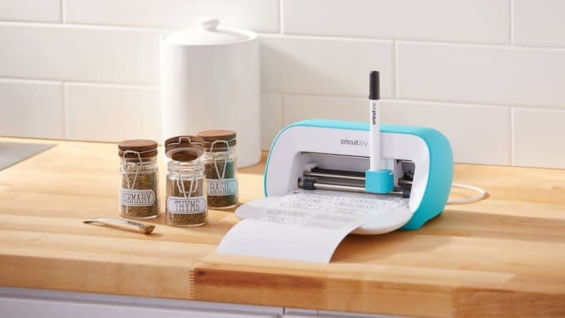 Make customized labels, acrylic calendars, water bottles, and charcuterie boards with this portable Cricut machine.