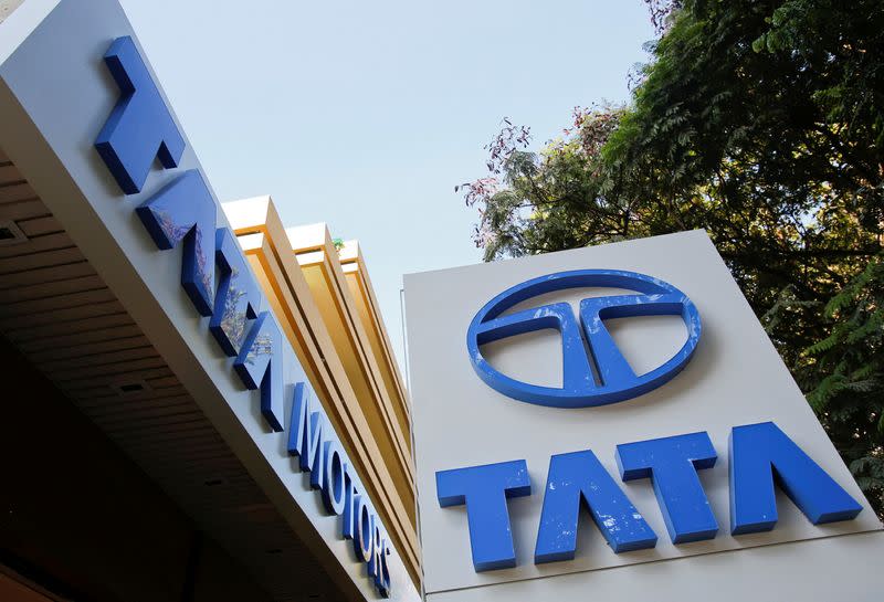 FILE PHOTO: Tata Motors logos are pictured outside their flagship showroom in Mumbai