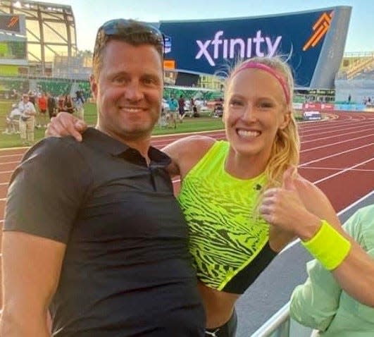 Sandi Morris savors victory with coach Brad Walker Friday at the 2022 U.S. Outdoor Track & Field Championships at Hayward Field in Eugene, Oregon.