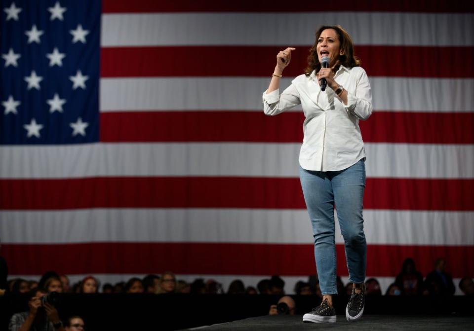 <p>While on the campaign trail in Iowa, discussing gun safety, Senator Harris paired a white shirt, with light wash jean, and trainers for a casual look.</p>