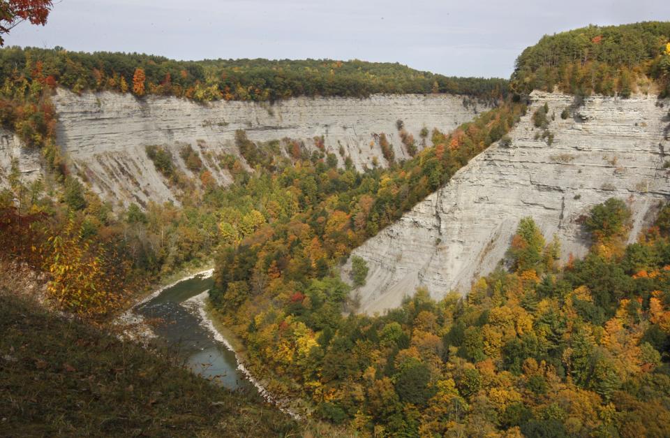 Foliage starts to take on the bright colors of fall in the gorge at Letchworth State Park in Mount Morris on Oct. 3, 2013.