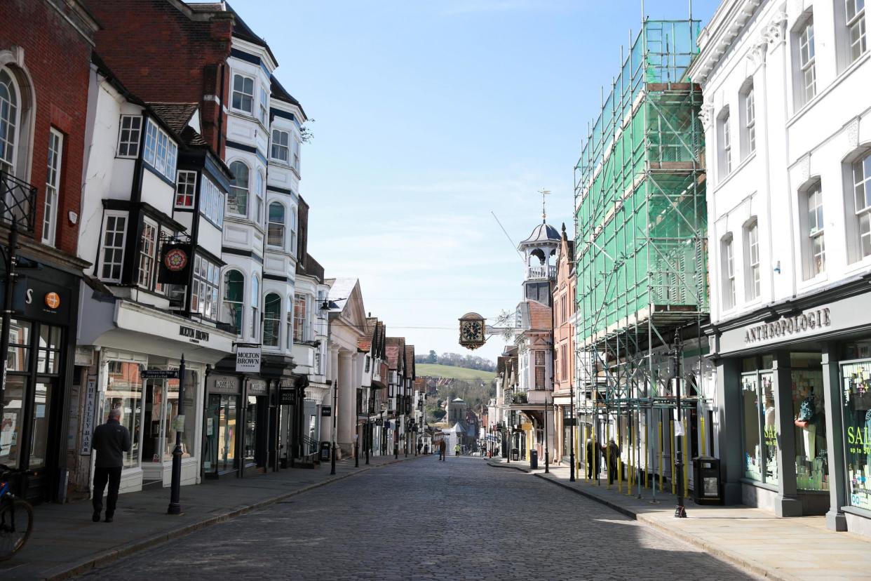 An empty high-street in Guildford the day after Prime Minister Boris Johnson put the UK in lockdown to help curb the spread of the coronavirus. (PA)