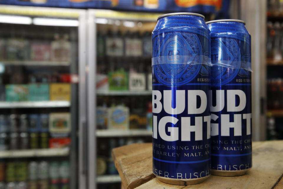 This Thursday, Jan. 10, 2019, photo shows cans of Bud Light in Washington. Starting next month, packages of Bud Light will have prominent labels showing the beer’s ingredients and calories as well as the amount of fat, carbohydrates and protein in a serving. Bud Light is likely the first of many to make the move. The labels aren’t legally required, but major beer makers agreed in 2016 to voluntarily disclose nutrition facts on their products by 2020. (AP Photo/Jacquelyn Martin)