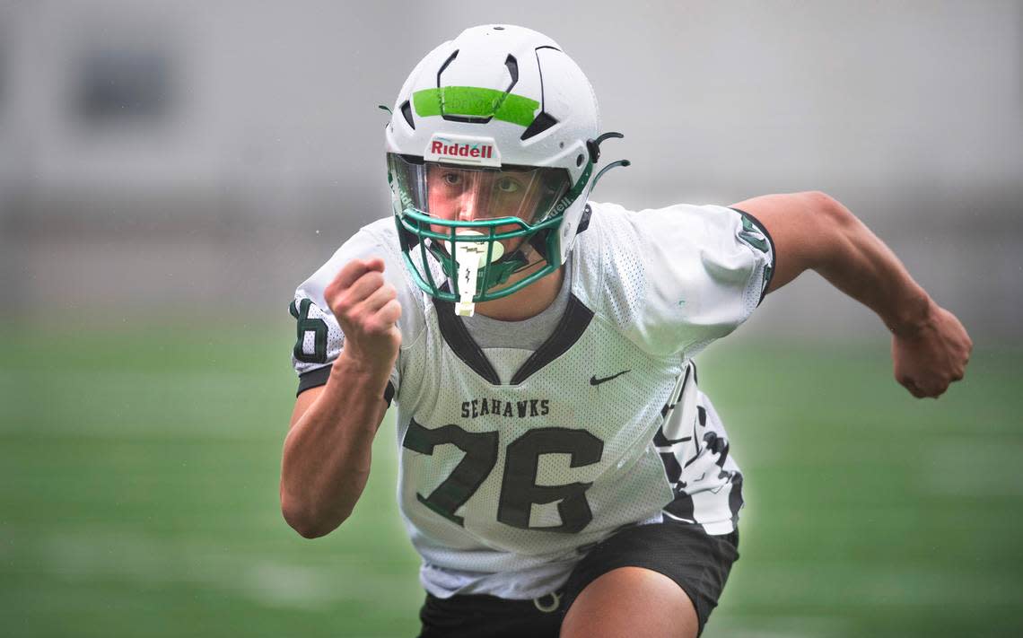 Peninsula linebacker Wyatt Abrigo runs through plays during preseason football practice at Peninsula High School in Purdy, Washington, on Friday, Aug. 23, 2024.