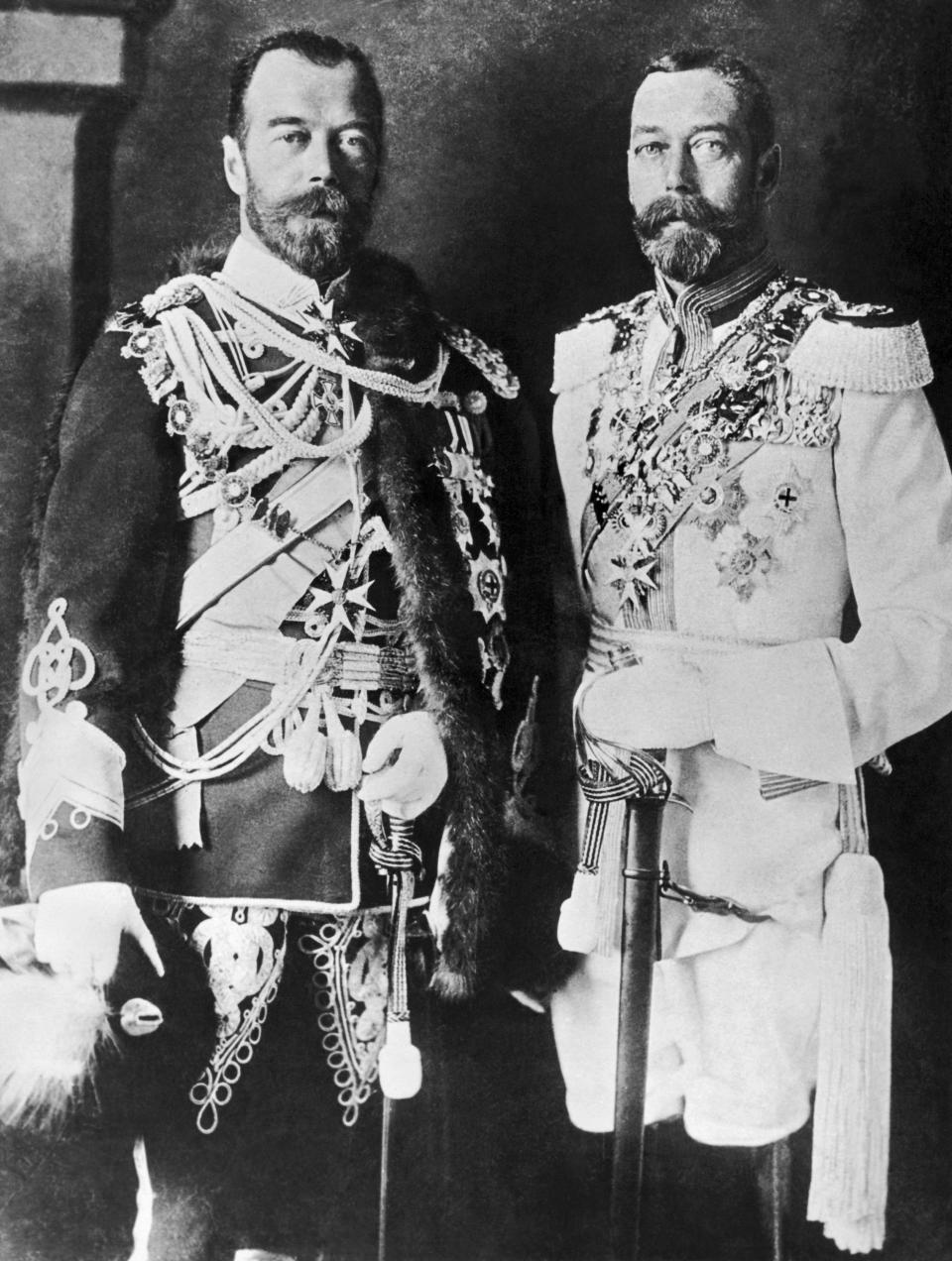Here are two cousins, Czar Nicholas II of Russia, at left, wearing an English uniform, and King George V of England, in Russian regimentals, England, circa 1915. It was a quaint courtesy observed among royal rulers of the time when visiting each other. (Photo by Underwood Archives/Getty Images)