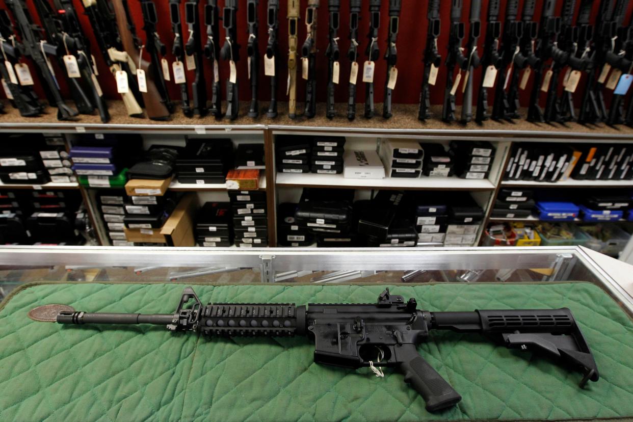 An AR-15 is displayed at the Firing-Line indoor range and gun shop July 26, 2012 in Aurora, Colo.