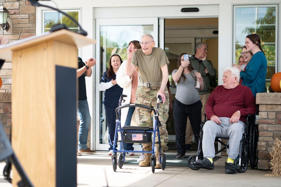 Veteran Bob Munie is surprised by a reenlistment ceremony for his 100th birthday at Lakeview Assisted Living in Battle Creek on Thursday, Oct. 6, 2022.