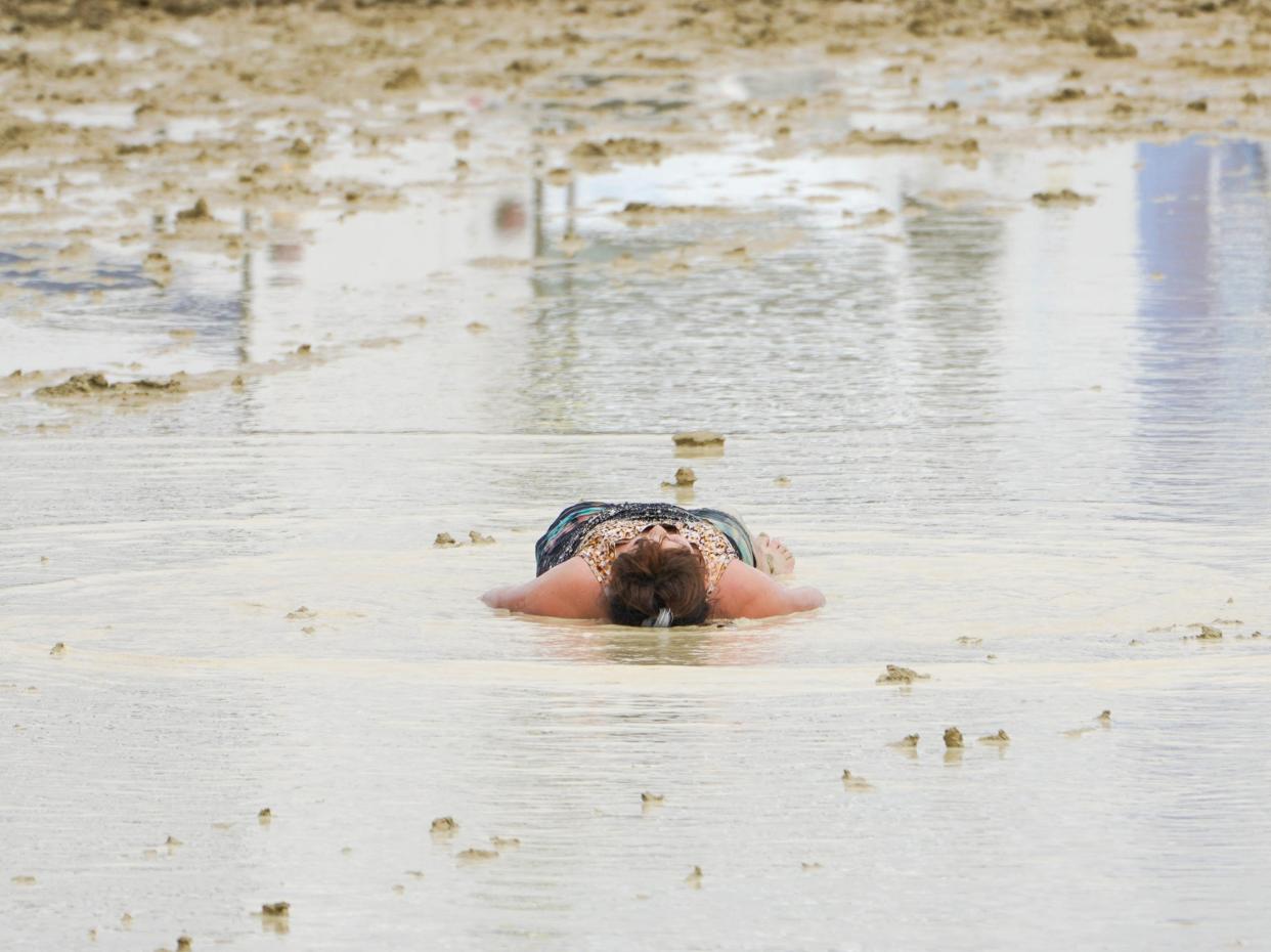 Burning Man revelers stranded in Nevada desert by rain and mud (via REUTERS)