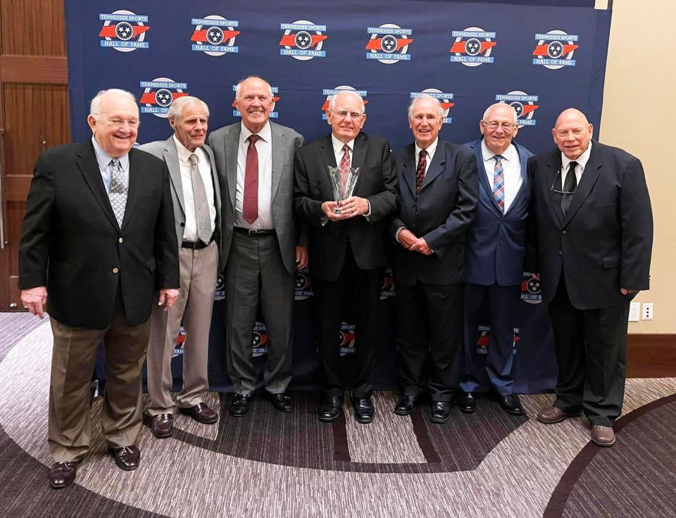 The 1958 Oak Ridge High School team was honored by the Tennessee Sports Hall of Fame in July. From left are members Sam Owen, Howard Dunnebacke, Larry Richards, Mike Brady, Woody Barwick, Jimmie Culp, Skip Brinkman.