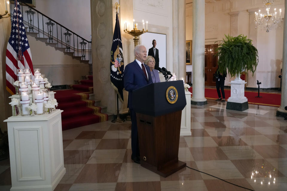 President Joe Biden, accompanied by first lady Jill Biden, speaks on the one year anniversary of the school shooting in Uvalde, Texas, at the White House in Washington, Wednesday, May 24, 2023. (AP Photo/Andrew Harnik)