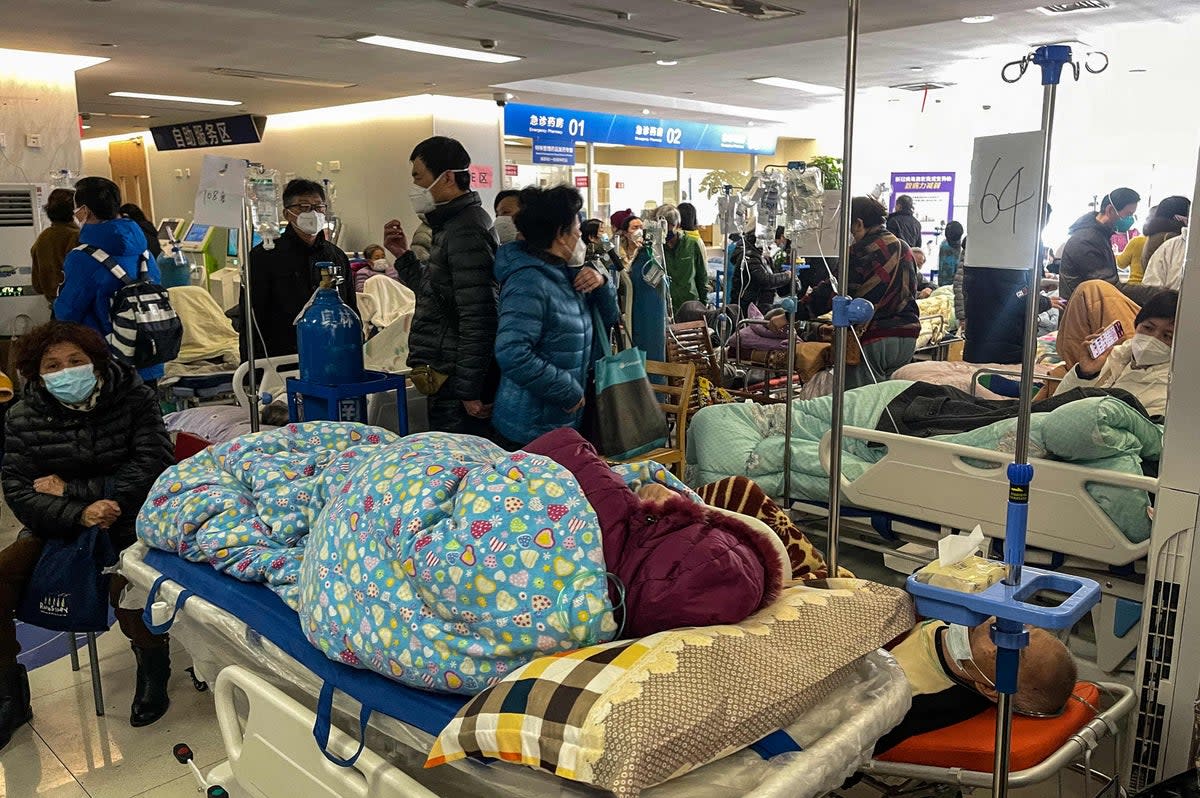 Patients on stretchers at a hospital in China   (AFP via Getty Images)