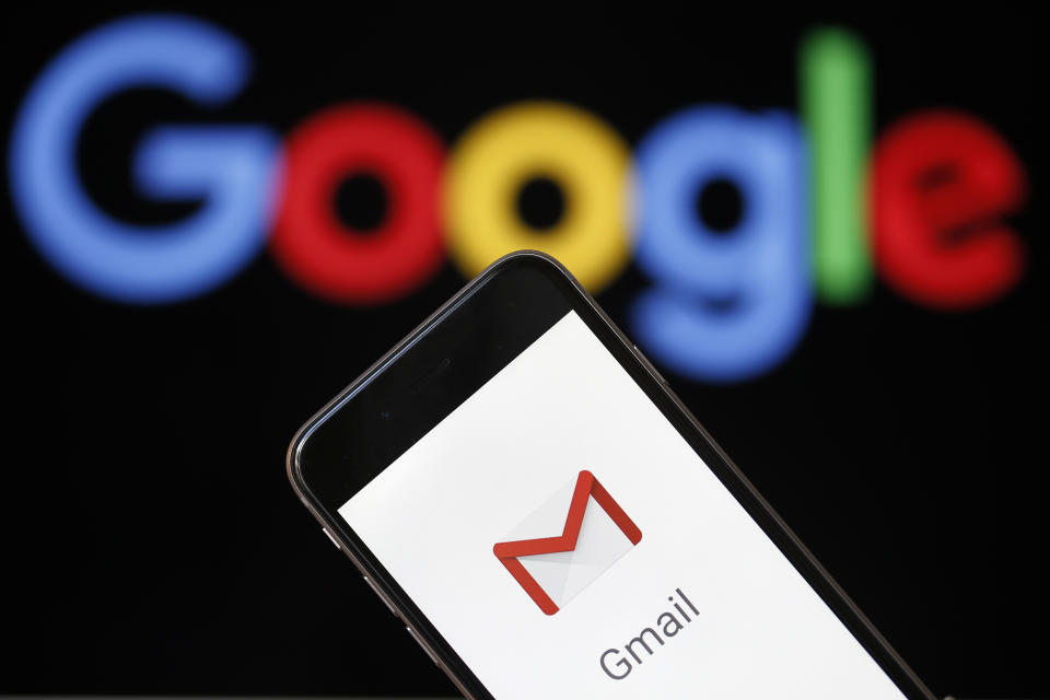 PARIS, FRANCE - JULY 04:  In this photo illustration, the logo of the Gmail app homepage is seen on the screen of an iPhone in front of a computer screen showing a Google logo on July 04, 2018 in Paris, France.  According to the Wall Street Journal dozens of Google partner companies have access to emails from 1.5 billion Gmail users. Gmail is a free email service offered by Google.  (Photo Illustration by Chesnot/Getty Images)