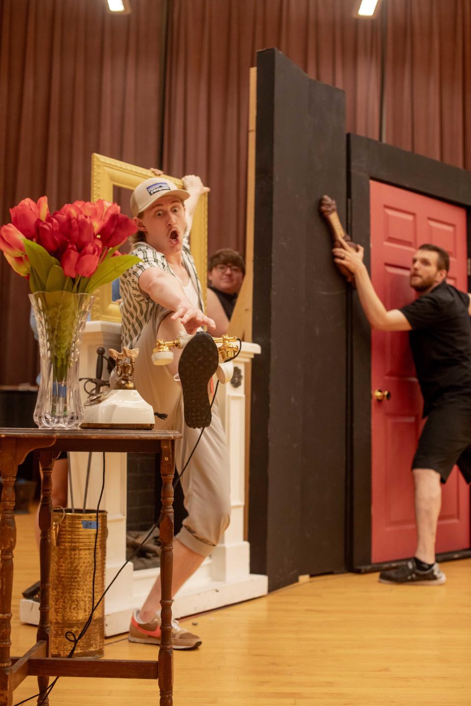 A rehearsal scene from "The Play That Goes Wrong!" presented by Lincoln Park Performing Arts Center.