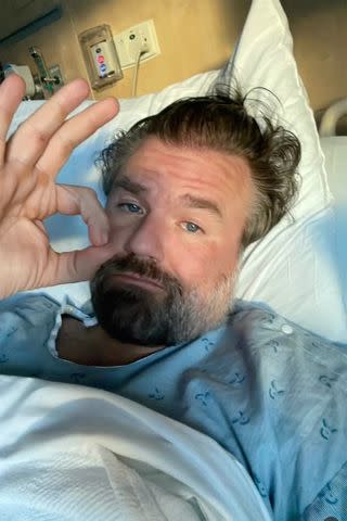 <p>Instagram/tlabine</p> Tyler Labine takes a photo from his hospital bed.