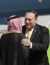 U.S. Secretary of State Mike Pompeo, right, is greeted by Saudi Foreign Minister Adel al-Jubeir, after arriving in Riyadh, Saudi Arabia, Tuesday Oct. 16, 2018. Pompeo arrived Tuesday in Saudi Arabia for talks with King Salman over the unexplained disappearance and alleged slaying of Saudi writer Jamal Khashoggi, who vanished two weeks ago during a visit to the Saudi Consulate in Istanbul.(Leah Millis/Pool via AP)