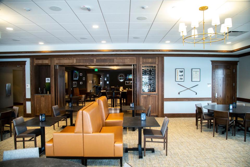 Seating inside Bump's Restaurant, named after Chalmers "Bump" Elliott, sits in the Nagle Family Clubhouse at the Finkbine Golf Course in Iowa City.