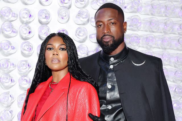 <p>Cindy Ord/MG23/Getty Images for The Met Museum/Vogue</p> Gabrielle Union and Dwyane Wade at the 2023 Met Gala