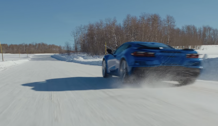 The Corvette E-Ray with eAWD shown driving in the snow.