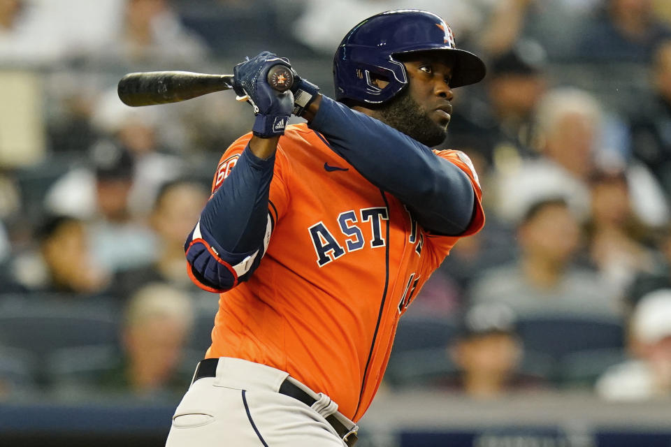 Houston Astros' Yordan Alvarez follows through on a three-run home run against the New York Yankees during the third inning of a baseball game Thursday, June 23, 2022, in New York. (AP Photo/Frank Franklin II)