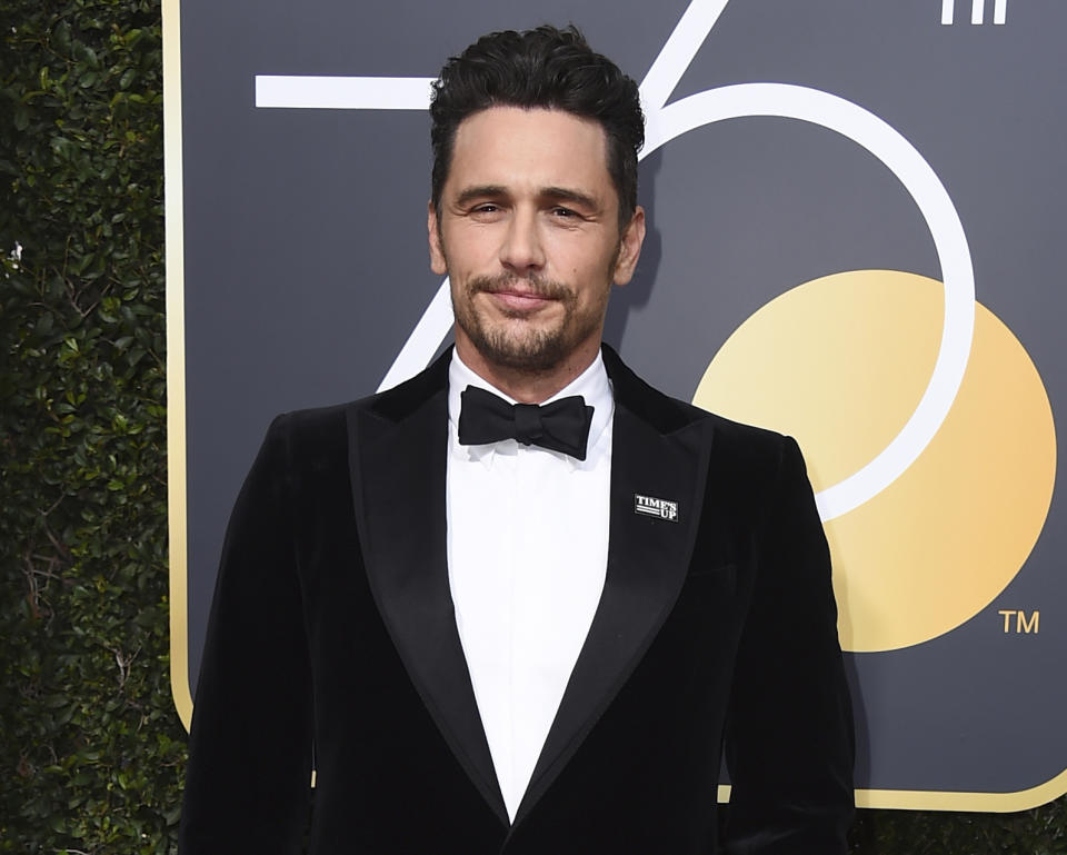 FILE - In this Jan. 7, 2018 file photo, James Franco arrives at the 75th annual Golden Globe Awards in Beverly Hills, Calif. Two actresses have sued Franco and his former acting and film school, saying they were pushed into gratuitous and exploitative sexual situations as his students. (Photo by Jordan Strauss/Invision/AP, File)