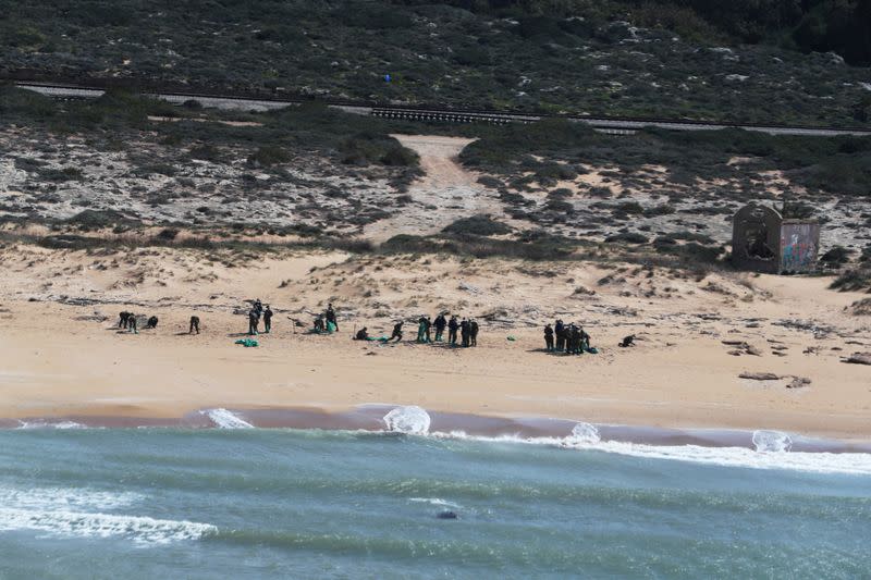 FILE PHOTO: Israel's beaches blackened by tar after offshore oil spill