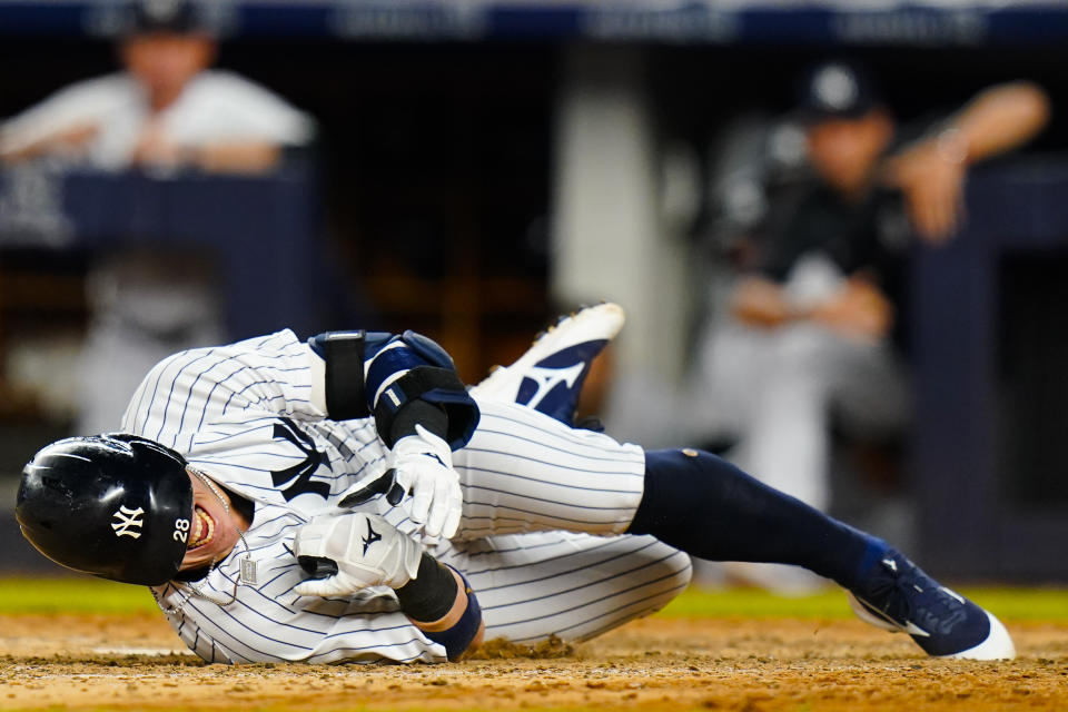 New York Yankees' Josh Donaldson reacts after being hit by a pitch during the eighth inning of the team's baseball game against the Cincinnati Reds on Thursday, July 14, 2022, in New York. (AP Photo/Frank Franklin II)