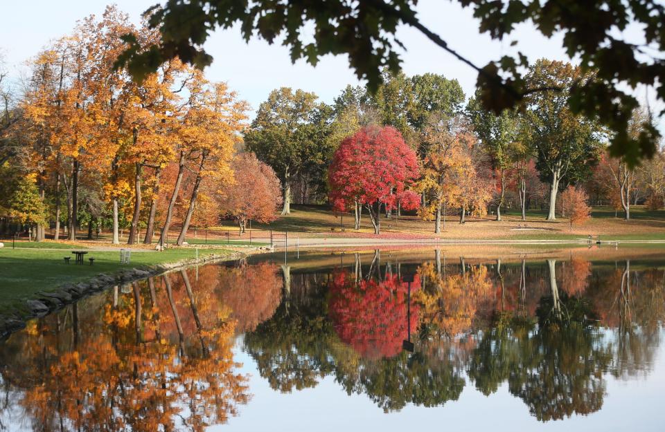 Fall colors are reflected in the water at Munroe Falls Metro Park.