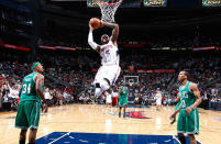 ATLANTA, GA - MAY 01: Josh Smith #5 of the Atlanta Hawks dunks between Paul Pierce #34 and Avery Bradley #0 of the Boston Celtics in Game Two of the Eastern Conference Quarterfinals in the 2012 NBA Playoffs at Philips Arena on May 1, 2012 in Atlanta, Georgia. NOTE TO USER: User expressly acknowledges and agrees that, by downloading and or using this photograph, User is consenting to the terms and conditions of the Getty Images License Agreement. (Photo by Kevin C. Cox/Getty Images)