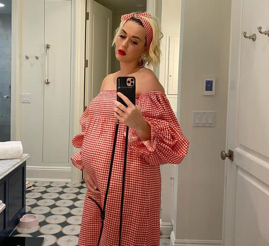 <p>Katy Perry/Instagram</p> Katy Perry holding her baby bump
