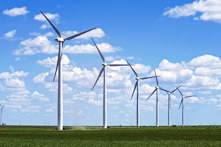 Wind turbines in a field.