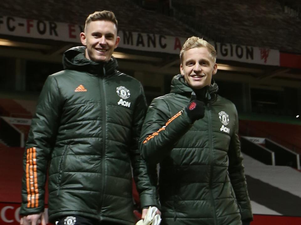 Manchester United’s Dean Henderson and Donny van de Beek (Manchester United via Getty Images)