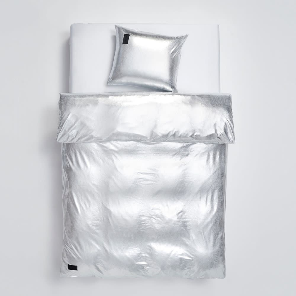 <p><a href="https://go.redirectingat.com?id=74968X1596630&url=https%3A%2F%2Fwww.farfetch.com%2Fshopping%2Fmen%2Fmagniberg-nude-metallic-duvet-cover-item-22466119.aspx&sref=https%3A%2F%2Fwww.elle.com%2Ffashion%2Fshopping%2Fg46676320%2Fbest-luxury-duvet-covers%2F" rel="nofollow noopener" target="_blank" data-ylk="slk:Shop Now;elm:context_link;itc:0;sec:content-canvas" class="link rapid-noclick-resp">Shop Now</a></p><p>Metallic Duvet Cover</p><p>farfetch.com</p><p>$1021.00</p>