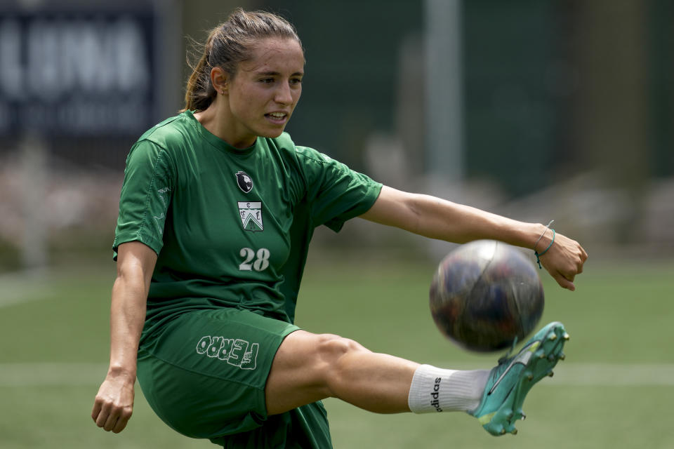 Ferrocarril Oeste's winger Eponine Howarth, from France, controls the ball during a women's professional team training session in Buenos Aires, Argentina, Friday, Feb. 16, 2024. Known as “Epo," the 27-year-old said Argentina allowed her to play professional soccer again after stopping to study law and become a social researcher in England. (AP Photo/Natacha Pisarenko)