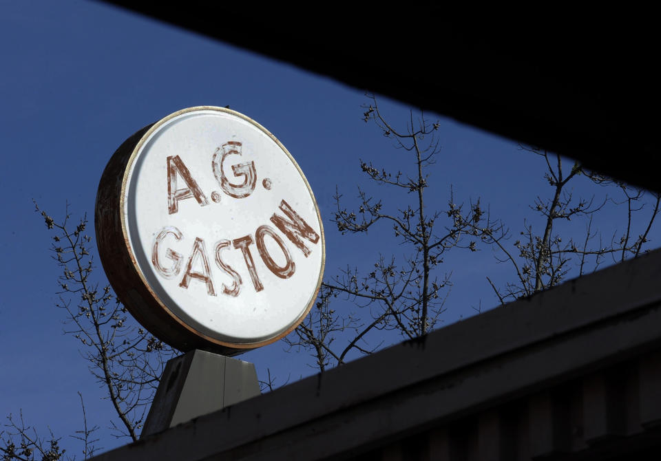 This photo taken Monday, Jan. 9, 2017, shows the sign at the now-abandoned A.G. Gaston Motel in Birmingham, Ala. Once used by The Rev. Martin Luther King Jr., the motel will be renovated as the city's civil rights district joins the National Park Service under a proclamation signed by President Barack Obama on Thursday, Jan. 12. (AP Photo/Jay Reeves)