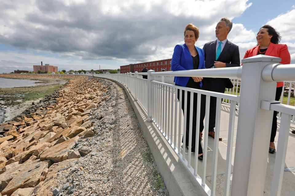 Attorney General Maura Healey, who recently won the Democratic primary for Massachusetts Governor, is joined by New Bedford Mayor Jon Mitchell and Kim Driscoll, Democratic Lt. Gov nominee, during a tour of  the Harborwalk on Gifford Street in the south end of the city.