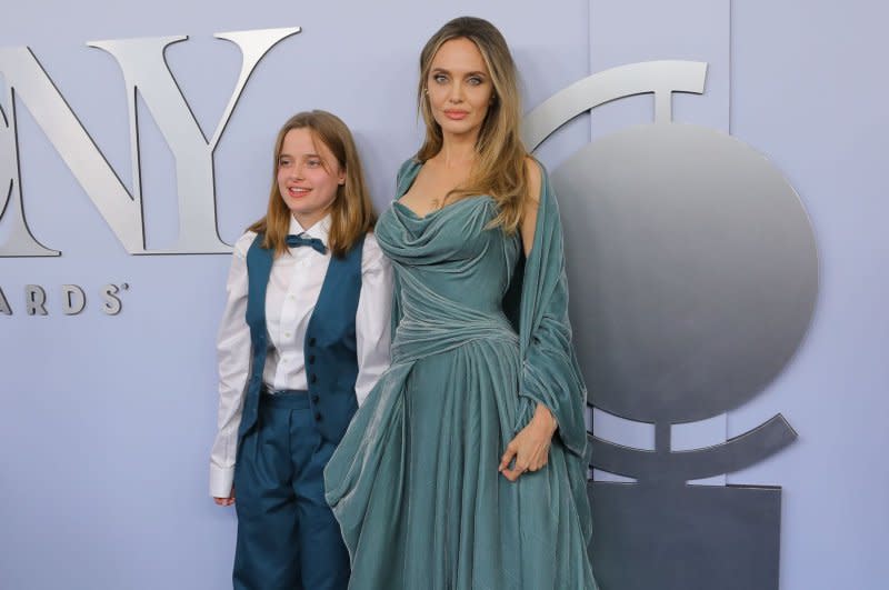 Vivienne Jolie and Angelina Jolie arrive on the red carpet at the Tony Awards at David H. Koch Theater at Lincoln Center for the Performing Arts on Sunday in New York City. Photo by Serena Xu Ning/UPI