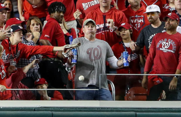 Bud Light sending Nats fan hit in chest with home run ball while  double-fisting beers to World Series Game 6