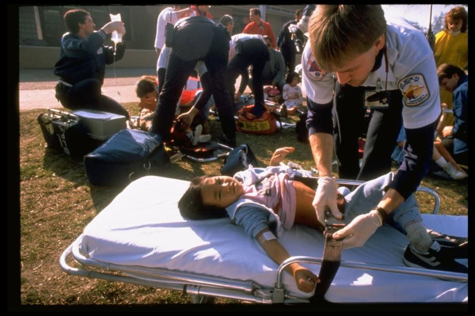 <div class="inline-image__caption"><p>A young girl wounded in the chest during the shooting at Cleveland School by Patrick Purdy, being attended to by medical personnel.</p></div> <div class="inline-image__credit">Michael Chow/The LIFE Images Collection via Getty</div>