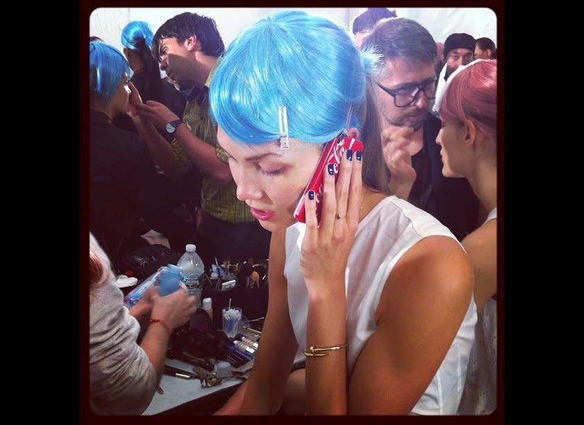 It's electric! Karlie Kloss sporting bright blue hair at Anna Sui Spring 2013. #nyfw #backstagebeauty  