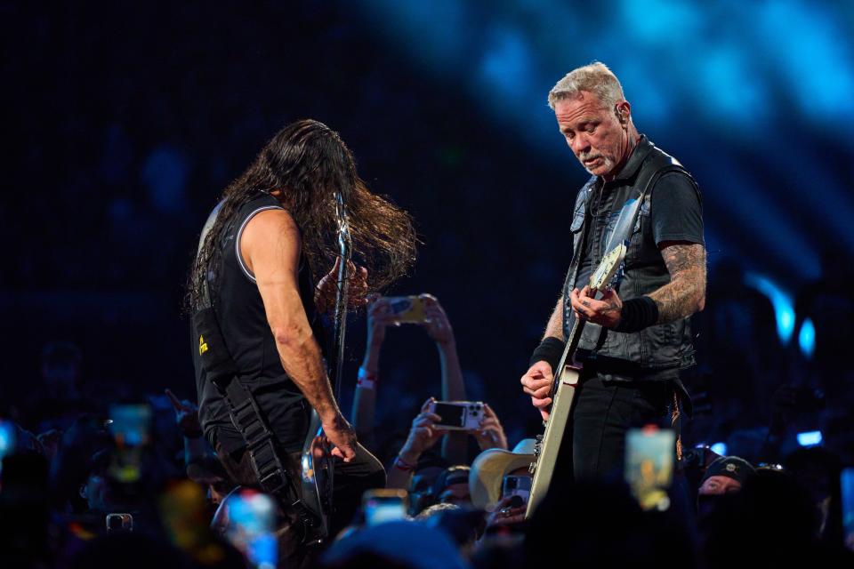 Metallica frontman James Hetfield (right) and bassist Robert Trujillo perform "Ride The Lightning" during the second night of the M72 World Tour at State Farm Stadium in Glendale on Sept. 9, 2023.