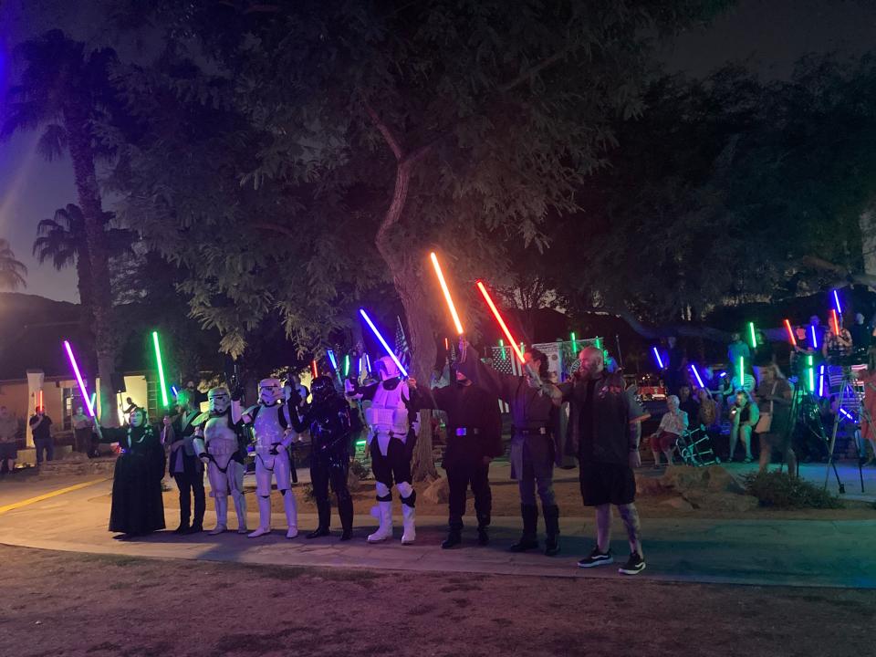 Nine people dressed up as characters from Star Wars to honor Marine Cpl. Hunter Lopez, of Indio, at a candlelight vigil on the one year anniversary of his death on Aug. 26, 2022. Lopez had been a Star Wars fan.