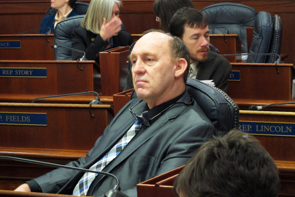 FILE - This Feb. 12, 2018 file photo, Alaska state Rep. Gary Knopp waits during a break in a floor session in which the House failed to elect a permanent speaker in Juneau, Alaska. The Alaska House Majority says Knopp was killed in the mid-air collision of two planes near Soldotna on Friday, July 31, 2020. Alaska State Troopers would not confirm Knopp's death beyond saying the mid-air collision near the airport in Soldotna was a fatal crash. (AP Photo/Becky Bohrer, File)