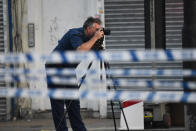 <p>A police forensics officer works in a road near an incident near Finsbury Park Mosque in which a van ploughed into pedestrians, is pictured on June 19, 2017 in London, England. (Photo: Carl Court/Getty Images) </p>