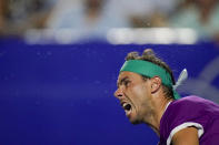 Spain's Rafael Nadal serves to Britain's Cameron Norrie in the final match at the Mexican Open tennis tournament in Acapulco, Mexico, Saturday, Feb. 26, 2022. (AP Photo/Eduardo Verdugo)