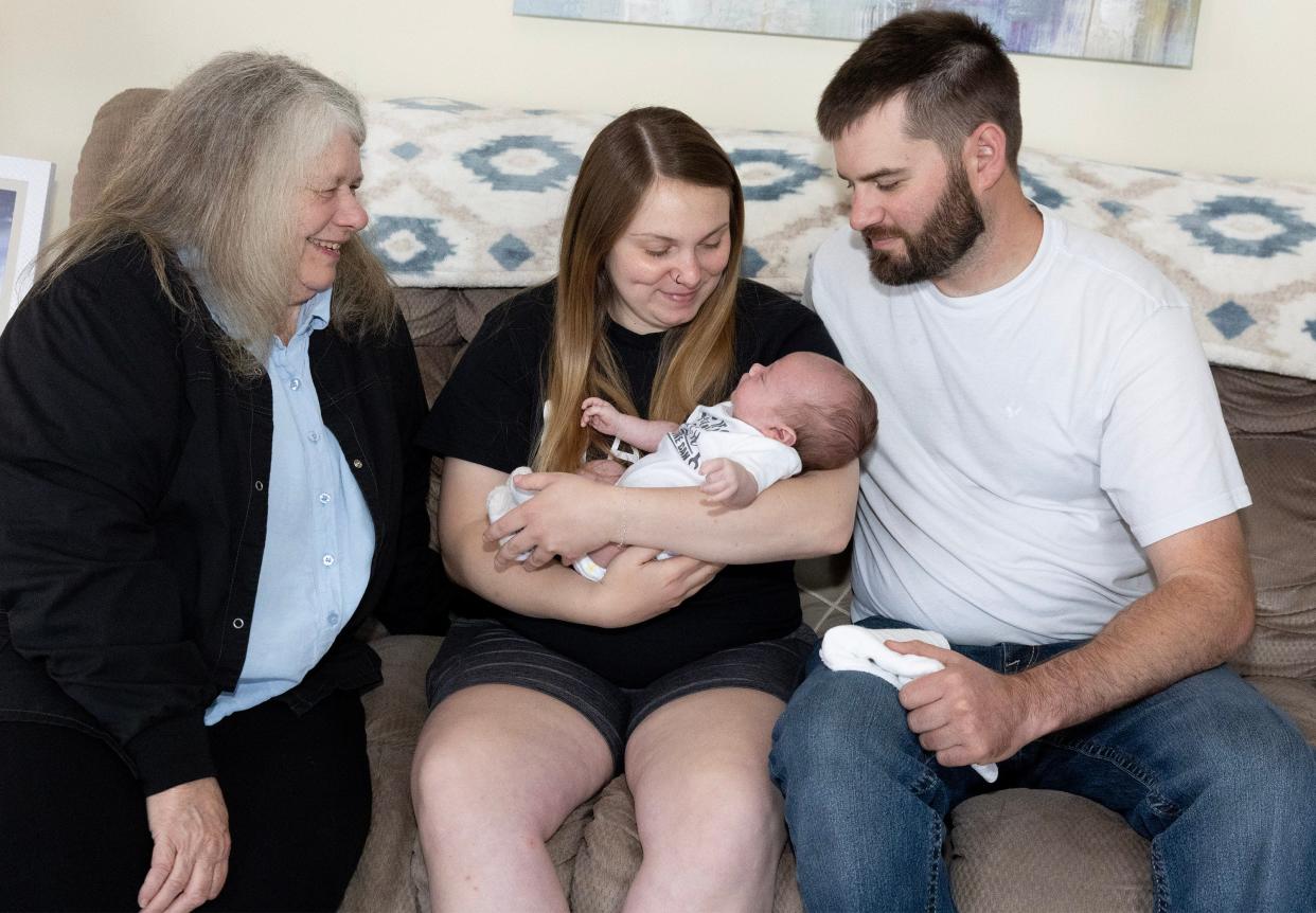 Carol Frient, a board-certified lactation consultant and owner of the Milk Van, visits with new parents Abbi Yakunich and Brandon Denham  of Massillon and their newborn son, Paxton, who was born on May 27. The couple has opted to feed Paxton formula following some issues with breastfeeding.