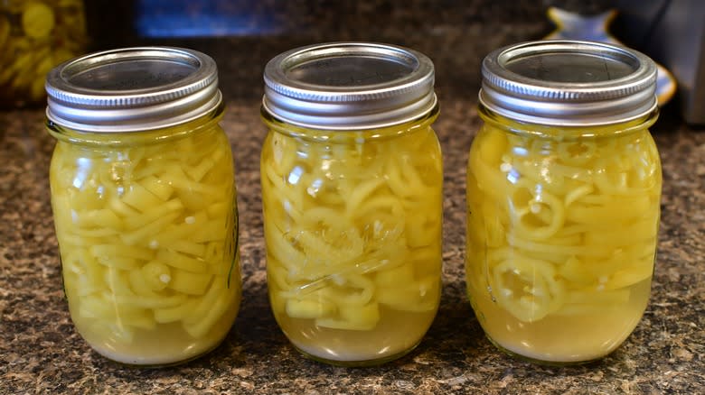three jars of pickled banana peppers