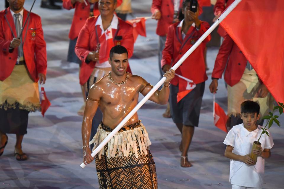 Tonga’s flagbearer Pita Nikolas Taufatofua leads his delegation during the opening ceremony of the Rio 2016 Olympic Games. (Getty)